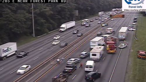 The wreck occurred shortly before 12:30 p.m. near the Moreland Avenue exit on I-285.
