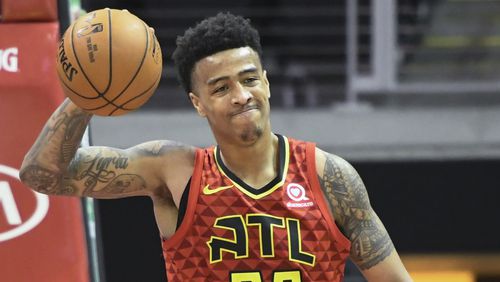 Atlanta Hawks forward John Collins reacts after being fouled by the Chicago Bulls March 11, 2018, in Atlanta. (AP Photo/John Amis)