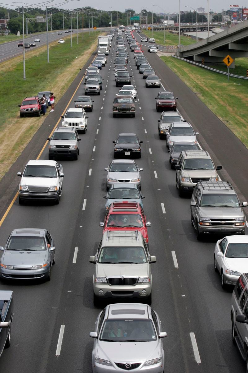 Motorists drive on Interstate 10 west as they evacuate ahead of Hurricane Katrina August 28, 2005 in New Orleans, Louisiana. A "contraflow" program was set up by state police that allowed all interstate traffic lanes to head either west or north away from the storm. (Photo by Chris Graythen/Getty Images)