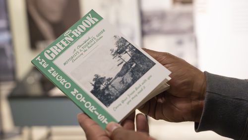A replica of "The Negro Motorist Green Book," at the new exhibit for "The Green Book." The exhibit opens at the Jimmy Carter Presidential Library and Museum on Saturday, March 30, 2024. (Olivia Bowdoin for the AJC).