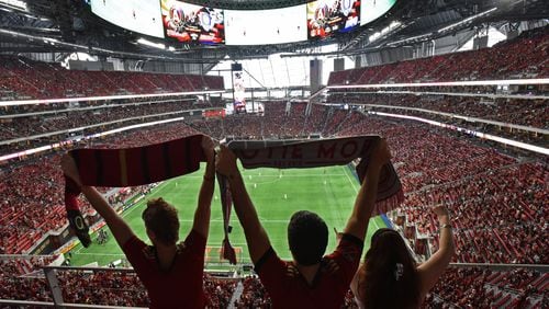 September 16, 2017 Atlanta - Atlanta United fans cheer for their team before an MLS soccer match against the Orlando City SC on Saturday, September 16, 2017. HYOSUB SHIN / HSHIN@AJC.COM
