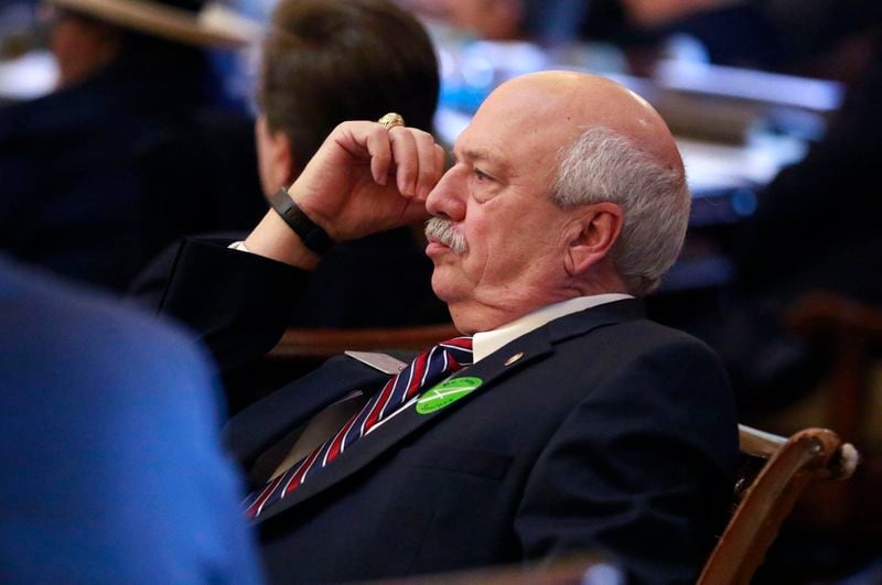 Jan. 28, 2016 - Atlanta - Rep. Tommy Benton, R - Jefferson, watches proceedings from his desk on the floor of the House. BOB ANDRES / BANDRES@AJC.COM