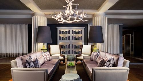 The living room of the W Atlanta-Buckhead hotel on Peachtree Road in Atlanta. The hotel recently sold to Woodbine Legacy Investments and fund’s parent company plans an extensive renovation. SPECIAL