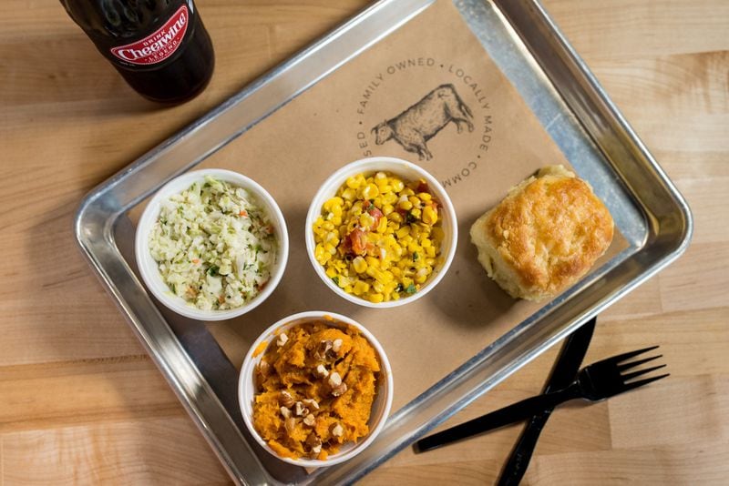  4 Rivers Smokehouse Vegetarian Sideboard with homemade biscuit, corn, coleslaw, and sweet potato casserole. Photo credit- Mia Yakel.