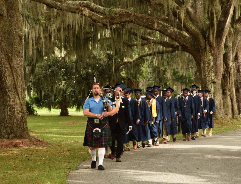 Bethesda Academy graduates maintained an honored tradition as, led by a bagpiper, they remembered their time with a "Reflection Walk" around campus.