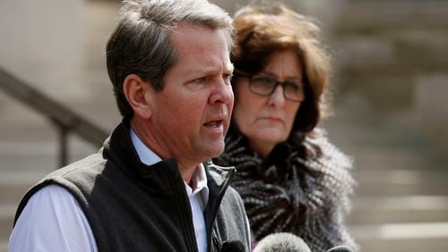 Gov. Brian Kemp prepares to set off by helicopter to Talbot County to survey storm damage.  Bob Andres / bandres@ajc.com