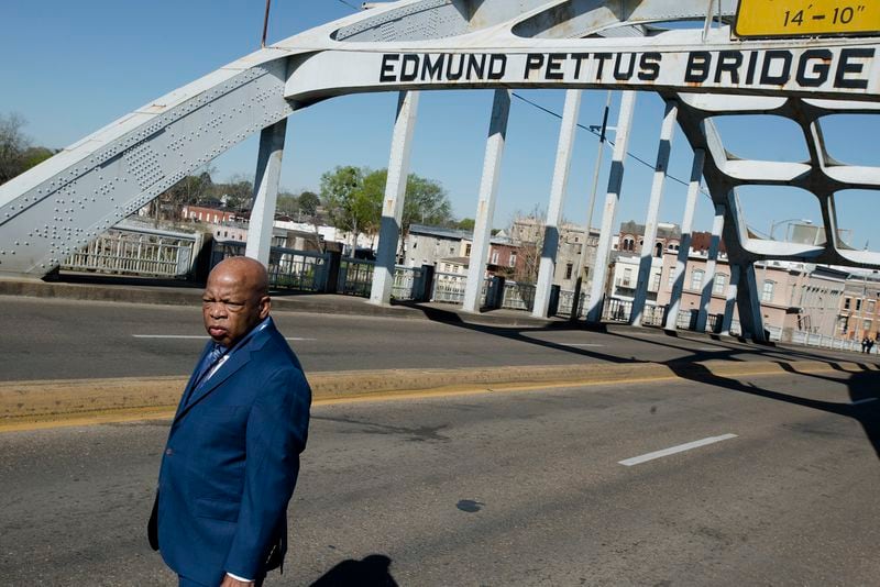 Congressman John Lewis stands on the Edmund Pettus Bridge on Sunday, March 4, 2018, in Selma, Ala., during the annual commemoration of "Bloody Sunday," the day in 1965 when voting rights protesters were attacked by police as they attempted to cross the Edmund Pettus Bridge.  (Photo: Albert Cesare/The Montgomery Advertiser via AP)