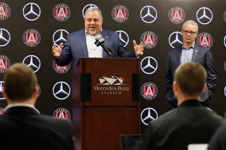 Atlanta United CEO/President Garth Lagerwey answers a question while AMB Sports and Entertainment CEO Steve Cannon looks on Tuesday. (Miguel Martinez / miguel.martinezjimenez@ajc.com)
 