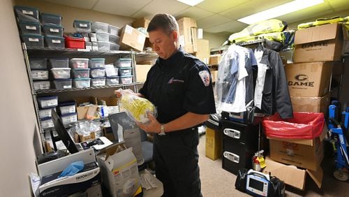 Paul Beamon, vice president of emergency medical services at AmeriPro EMS, unpacks supplies including a box of respirators bought from a local store, at AmeriPro EMS in Riverdale on Wednesday, March 18, 2020. As Atlanta falls deeper into the grips of the coronavirus pandemic, medical professionals are having trouble finding enough supplies and equipment to treat patients and protect health care providers.  (Hyosub Shin / Hyosub.Shin@ajc.com)