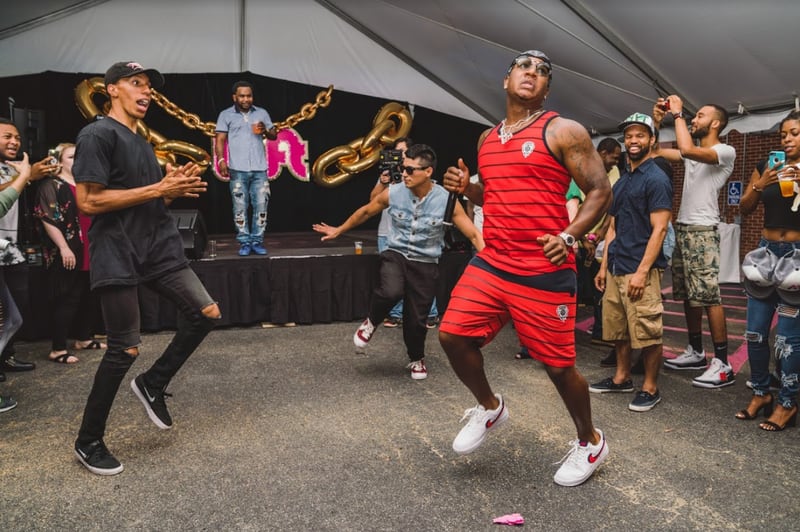 "It's Goin' Down" in this photo with Yung Joc (dancing right) at the launch party for the new Lyft recording studio in Atlanta.(Provided by Lyft)