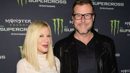 ANAHEIM, CA - JANUARY 23: Actors Tori Spelling (L) and Dean McDermott attend Monster Energy Supercross Celebrity Night at Angel Stadium of Anaheim on January 23, 2016 in Anaheim, California. (Photo by Michael Kovac/Getty Images for Feld Entertainment)