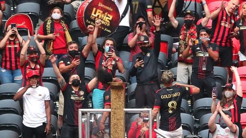 Atlanta United fans cheer on The Five Stripes as they prepare to play Philadelphia Union in the first leg of the CONCACAF Champions League quarterfinals Tuesday, April 27, 2021, at Mercedes-Benz Stadium in Atlanta. (Curtis Compton / Curtis.Compton@ajc.com)