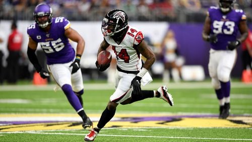 MINNEAPOLIS, MINNESOTA - SEPTEMBER 08: Wide receiver Justin Hardy #14 of the Atlanta Falcons runs the ball against the Minnesota Vikings in the game at U.S. Bank Stadium on September 08, 2019 in Minneapolis, Minnesota. (Photo by Hannah Foslien/Getty Images)