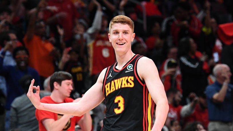 Hawks guard Kevin Huerter celebrates after scoring a 3-point basket during the second half in an NBA play-in tournament game against the Hornets on Wednesday night at State Farm Arena. The Hawks won 132-103. (Hyosub Shin / Hyosub.Shin@ajc.com)