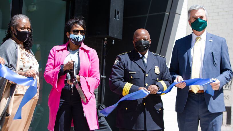 Atlanta Councilmember Joyce Sheperd (left), Mayor Keisha Lance Bottoms, interim police Chief Rodney Bryant and Dave Wilkinson, president and CEO of the Atlanta Police Foundation, cut the ribbon for the new At-Promise Center in Atlanta's Pittsburgh community. The facility will serve as a youth crime diversion and prevention center.