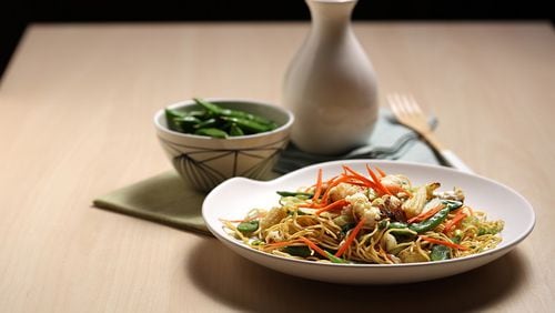 Fresh ginger and raw sliced scallions form a sauce to punch up noodles. Garnish as you like with bamboo shoots, quick-pickled cucumbers, roasted cauliflower or any other vegetables you have on hand. (E. Jason Wambsgans/Chicago Tribune/TNS)