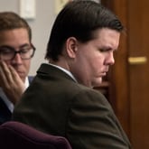 Justin Ross Harris during testimony at his trial in the Glynn County courthouse in Brunswick. At left is a member of his defense team, Carlos Rodriguez. (The Atlanta Journal-Constitution / Stephen Morton)