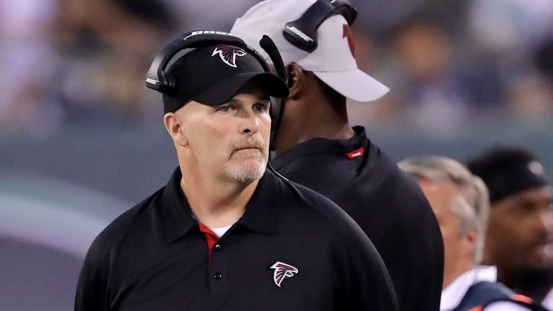 Falcons head coach Dan Quinn looks on from the sideline in the first half against the New York Jets during a preseason game Friday, Aug. 10, 2018 , at MetLife Stadium in East Rutherford, N.J.