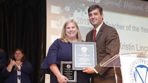 MCS Teacher of the Year for 2019 Kristin Lincoln, left, poses with superintendent Grant Rivera