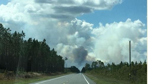Plumes of smoke are visible above the Okefenokee National Wildlife Refuge from the West Mims Fire. (Credit: National Wildfire Coordinating Group/inciweb.nwcg.gov)