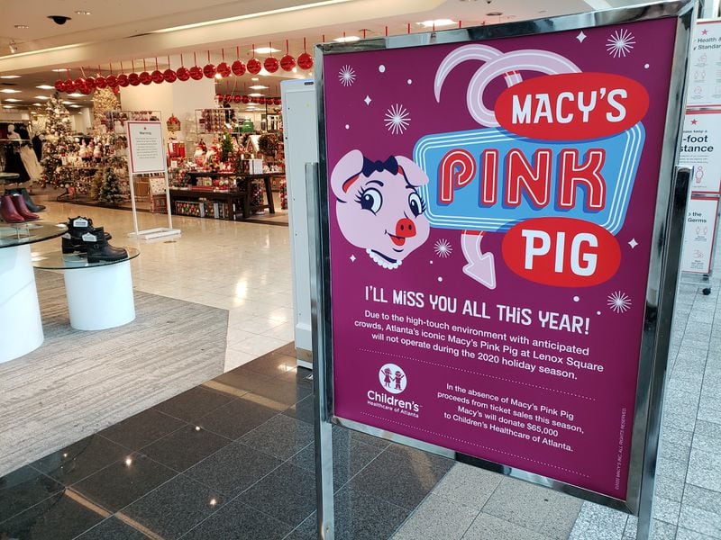 The Macy's Pink Pig ride at Lenox Square mall in Atlanta has been put on hold, one of the many pandemic-related shifts made in the holiday shopping scene this year. MATT KEMPNER / AJC