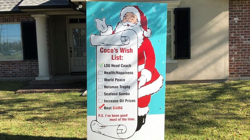 The Christmas list out front of Coco Orgeron's home in Larose, La., is heavily weighted toward local interests, including her son, Ed. (Steve Hummer/staff photo)