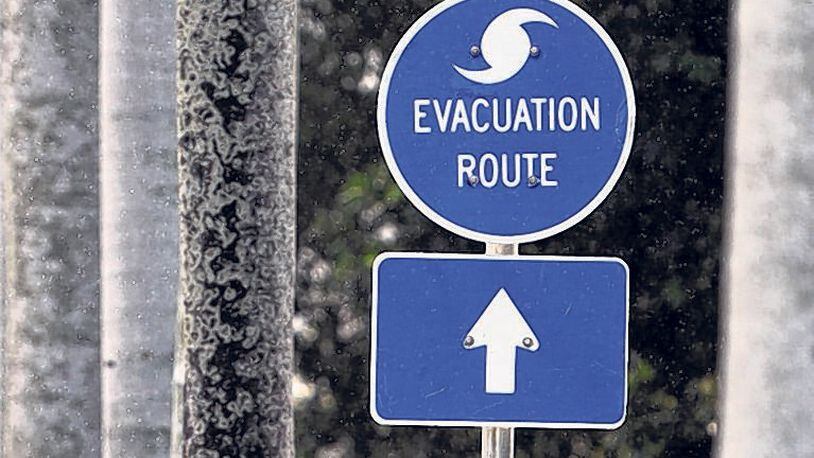 An evacuation route sign on Royal Palm Way in Palm Beach.