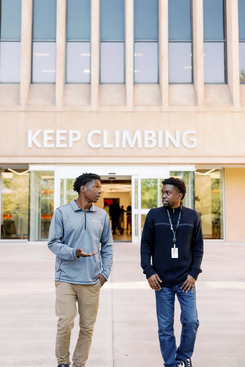 Brothers Enoch (left) and Joel Kigwila signed up for City of Refuge’s Tech Transformation Academy and realized it was a chance for them to kickstart careers in in-demand tech industries. Both now have jobs with Delta Air Lines. Photo courtesy of Savanna Kaye.