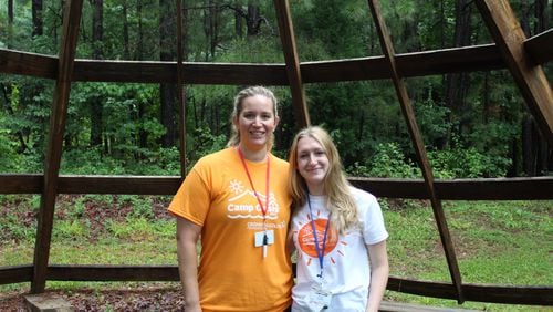 Dr. Chelly Dykes (left) volunteers to lead the medical team at Camp Oasis for kids like Emma Pelinsky with Crohn's and colitis diagnoses.