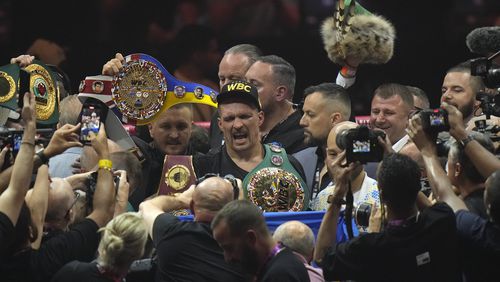 Ukraine's Oleksandr Usyk celebrates after beating Britain's Tyson Fury in their undisputed heavyweight world championship boxing fight at the Kingdom Arena in Riyadh, Saudi Arabia, Sunday, May 19, 2024. (AP Photo/Francisco Seco)