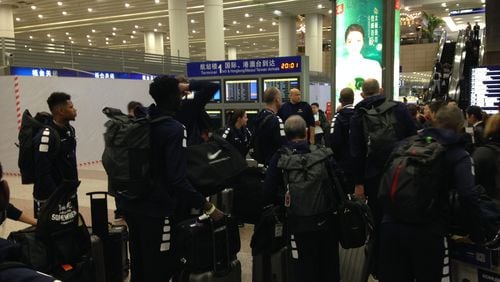 Georgia Tech basketball players and staff congregate in Shanghai Pudong International Airport on Saturday, Nov. 4, 2017 after claiming their baggage. (Photo by Ken Sugiura/AJC Staff)