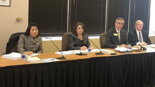 The State Election Board approved a plan Monday to allow Georgia voters to request absentee ballots by going online. From left: State Election Board members Anh Le, Rebecca Sullivan, Secretary of State Brad Raffensperger and David Worley. MARK NIESSE / MARK.NIESSE@AJC.COM