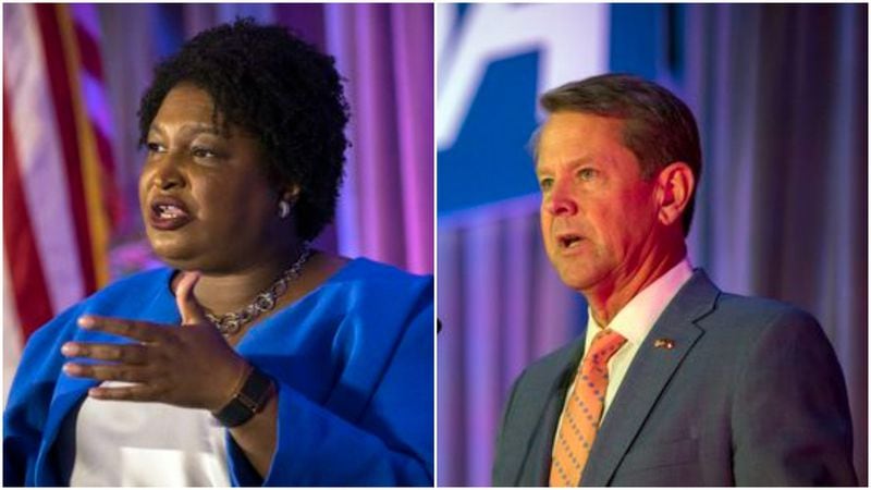 Georgia gubernatorial candidates Stacey Abrams, left, and Gov. Brian Kemp, right, speak at the Georgia School Boards Association conference in Savannah. (AJC Photo/Stephen B. Morton).