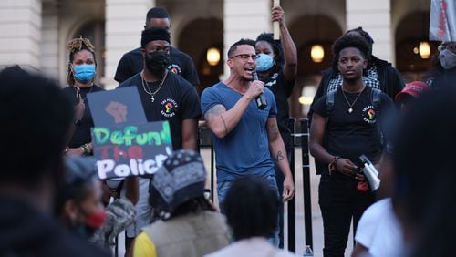 Atlanta City Councilman Antonio Brown addresses the crowd Friday, Sept. 25, 2020, at a rally in downtown Atlanta. Protesters expressed concerns that a criminal indictment against one police officer wasn’t enough in the Breonna Taylor case. (Ben Gray for The Atlanta Journal-Constitution)