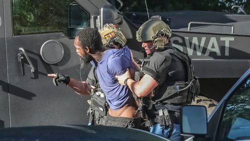 May 12, 2022 Cobb County: Cobb County Police SWAT officers took into custody a man after a nearly six-hour standoff after he barricaded himself inside the Taylor Apartment Homes on Bellemeade Drive in Cobb County on Thursday, May 12, 2022.