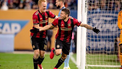 Atlanta United’s Eric Remedi and Jeff Larentowicz celebrate a goal last week against NYCFC.