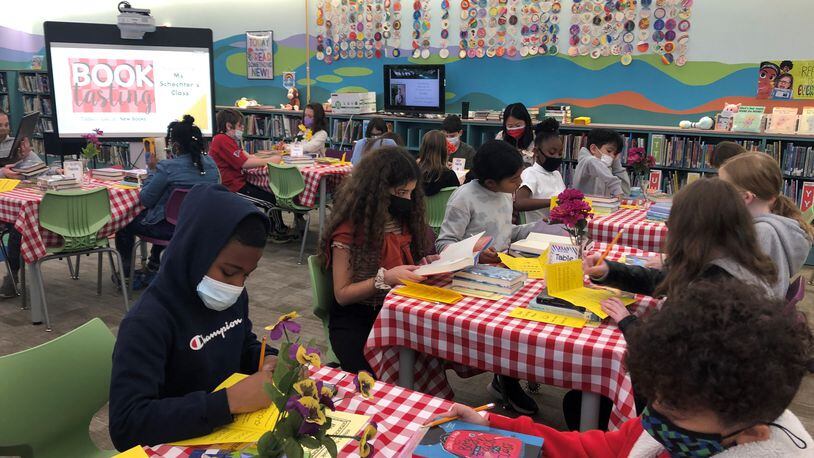 The library at River Eves Elementary frequently morphs into a Book Tasting cafe where students can explore a range of reading flavors.