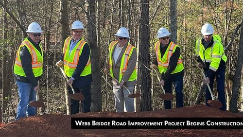 Alpharetta officials and staff gathered March 13 to break ground on two phases of the five-phase Webb Bridge Road Improvement Project. COURTESY CITY OF ALPHARETTA