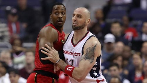 Marcin Gortat of the Wizards guards Dwight Howard of the Hawks in Game 5 of the Eastern Conference quarterfinals at Verizon Center on April 26, 2017 in Washington. (Photo by Rob Carr/Getty Images)