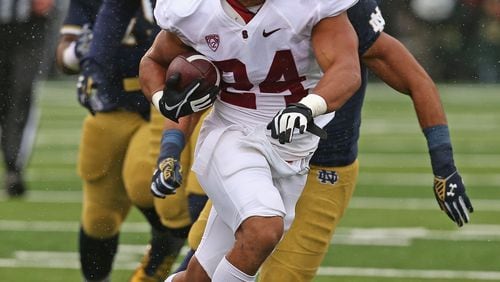 SOUTH BEND, IN - OCTOBER 04: Patrick Skov #24 of the Standford Cardinal runs against the Notre Dame Fighting Irish at Notre Dame Stadium on October 4, 2014 in South Bend, Indiana. (Photo by Jonathan Daniel/Getty Images) Former Stanford fullback Patrick Skov will enroll in Georgia Tech's MBA program following his graduation from Stanford in June. He will have immediate eligibility this fall. (GETTY IMAGES)