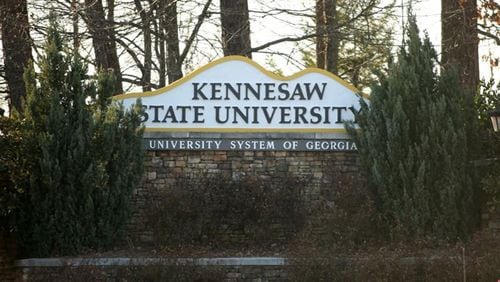 A former cheerleader at Kennesaw State University filed a lawsuit accusing university and elected officials of violating her civil rights during a dispute over the decision she and other cheerleaders made to kneel during the national anthem at football games last year. (Photo by The Atlanta Journal-Constitution)