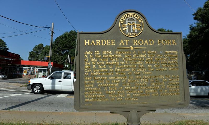 A sign at the intersection of Bouldercrest and Fayetteville roads marks an important stop in the Confederate trek on the eve of the Battle of Atlanta: It was at this Y-fork that the Southerners split ways. Two divisions pushed on toward East Atlanta, while the remaining two continued along Fayetteville Road for their date with Union forces. KENT D. JOHNSON / KDJOHNSON@AJC.COM