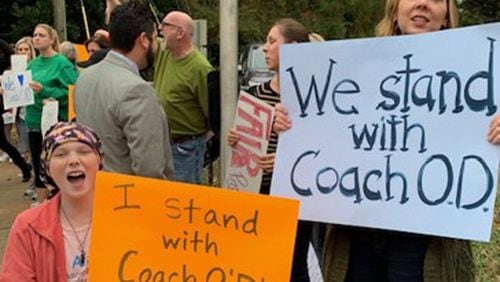 The suspension of a DeKalb County elementary school coach set off a massive showing of support. Today, supporters learned the coach will return on Monday.