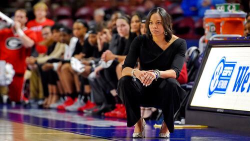 Georgia head coach Joni Taylor watches the action during the second half of a quarterfinal match against South Carolina at the Southeastern women's NCAA college basketball tournament in Greenville, S.C., Friday, March 6, 2020. (AP Photo/Richard Shiro)