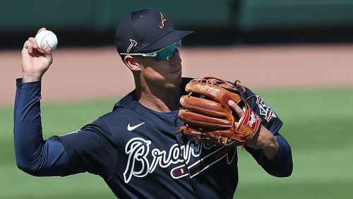 Atlanta Braves third baseman Jake Lamb fields a grounder during the first full-squad workout Tuesday, Feb. 23, 2021, at CoolToday Park in North Port, Fla. Lamb signed a $1 million non-guaranteed, major-league deal for the 2021 season. (Curtis Compton / Curtis.Compton@ajc.com)
