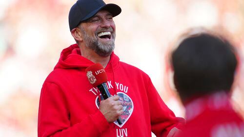 Liverpool's manager Jurgen Klopp reacts after his very last match with Liverpool after the English Premier League soccer match between Liverpool and Wolverhampton Wanderers at Anfield Stadium in Liverpool, England, Sunday, May 19, 2024. (AP Photo/Jon Super)