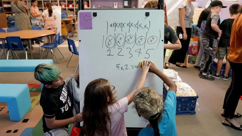 Students at Whittier Elementary School, in Mesa, Arizona, attend classes led by a team of teachers who have different skills and expertise. Credit: Matt York/Associated Press