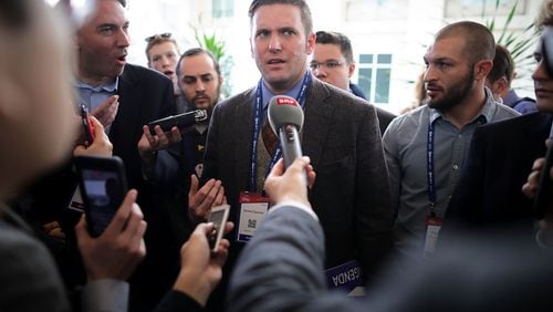 Reporters surround white supremacist Richard Spencer during the first day of the Conservative Political Action Conference at the Gaylord National Resort and Convention Center on Feb. 23, 2017, in National Harbor, Maryland. American Conservative Union Chairman Matt Schlapp said Spencer was “not part of the agenda” at CPAC. Hosted by the American Conservative Union, CPAC is an annual gathering of right-wing politicians, commentators and their supporters. (Photo by Chip Somodevilla/Getty Images)