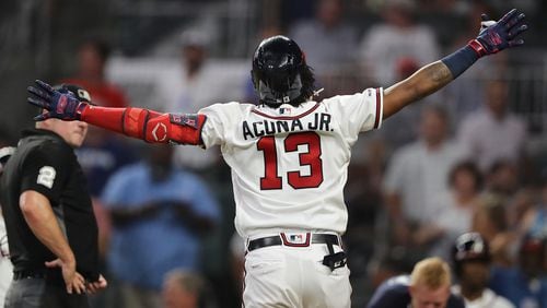Atlanta Braves' Ronald Acuna Jr. heads home hitting his 34th home run of the season during the fourth inning against the New York Mets to take a 4-1 lead with the solo shot in a MLB baseball game on Tuesday, August 13, 2019, in Atlanta.   Curtis Compton/ccompton@ajc.com