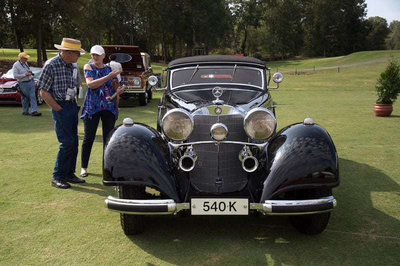 Charles Giffin (L) and Virginia Windsor look over a 1937 Mercedes-Benz Saturday at the second annual Atlanta Concours d’Elegance at Chateau Elan in Braselton, GA September 30, 2017. STEVE SCHAEFER / SPECIAL TO THE AJC